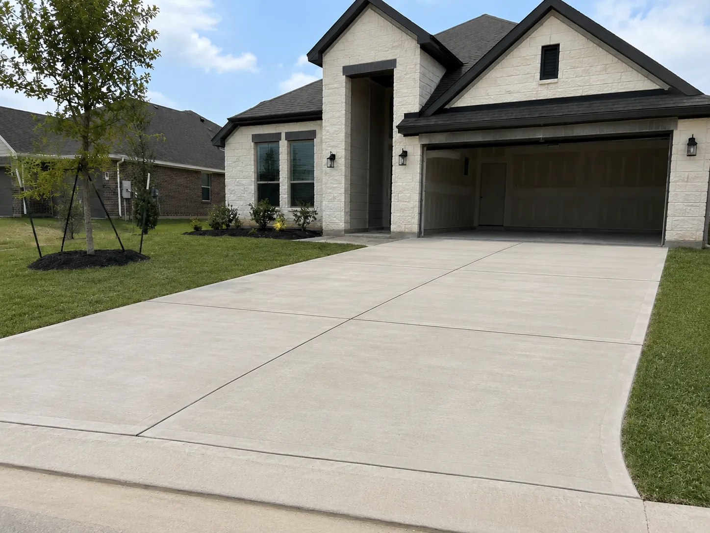 Completed concrete driveway after installation