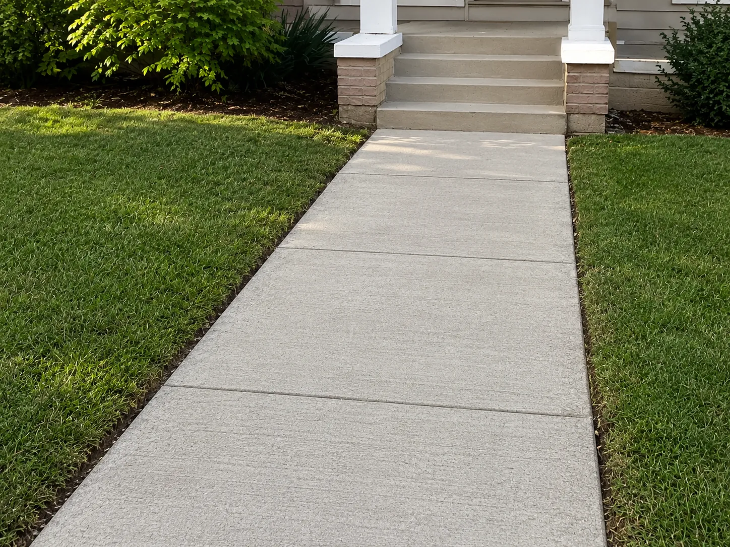 Concrete walkway after replacement